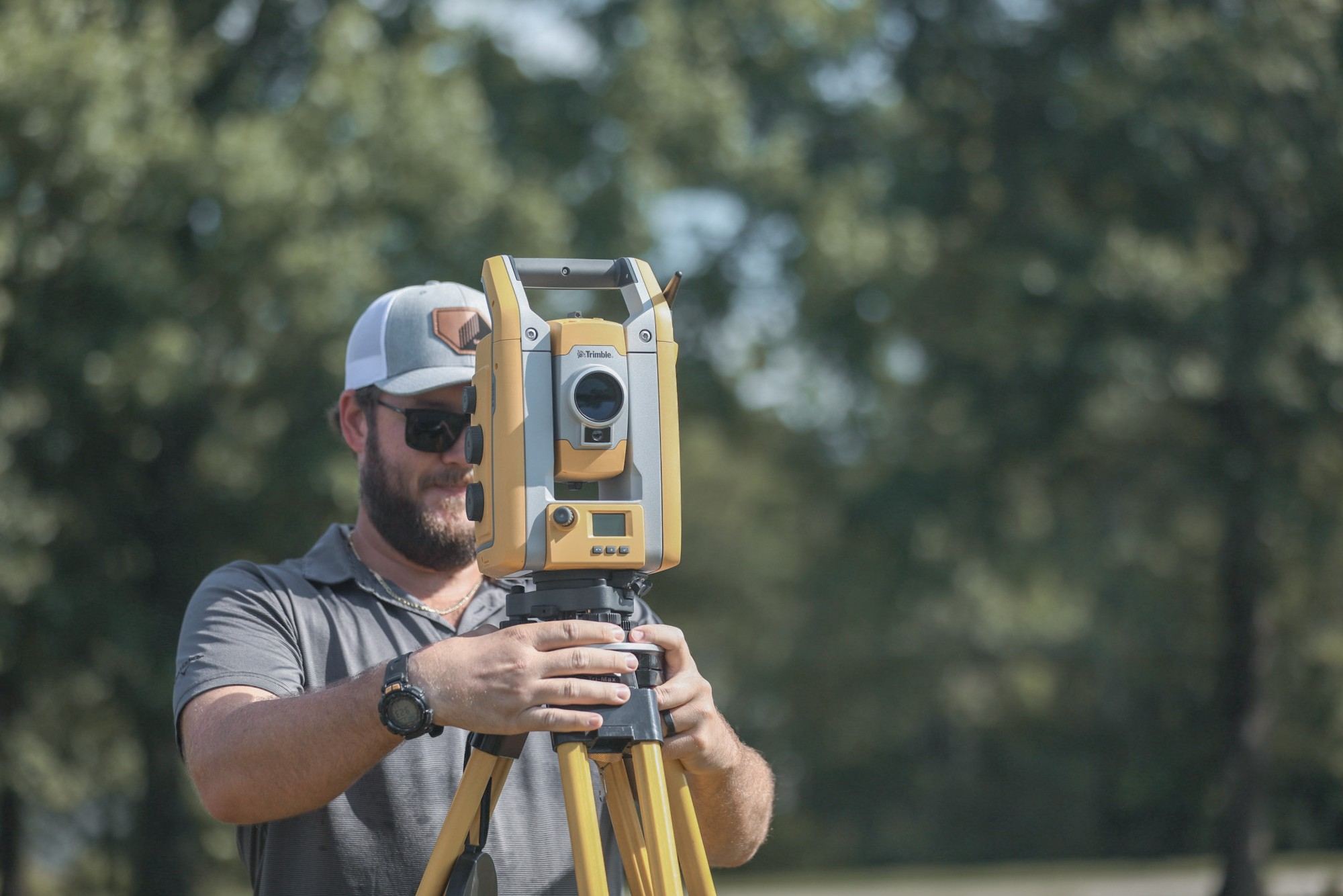 Samford Group licensed surveyor with a robotic total station