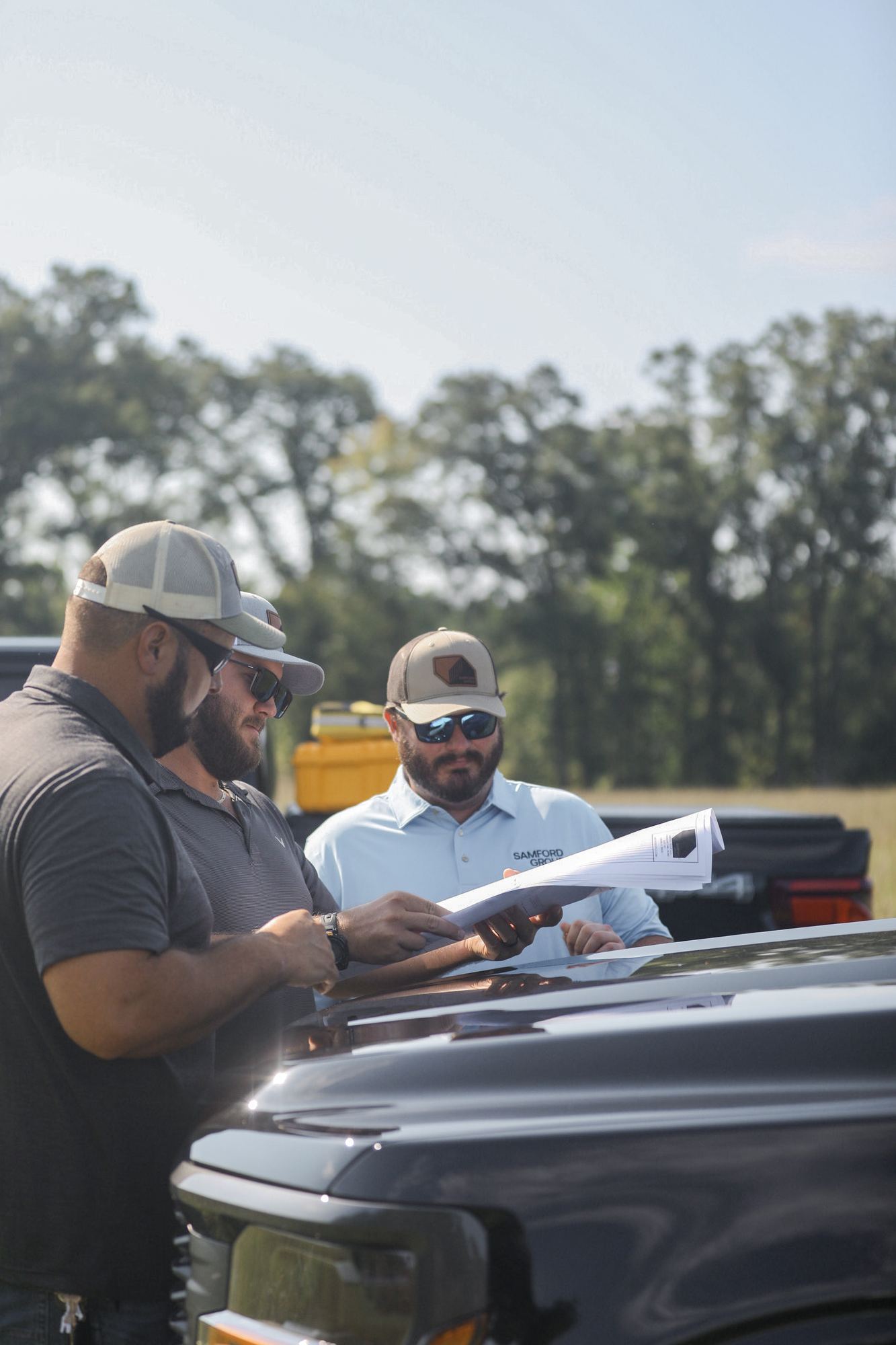 Samford Group surveyors reviewing property plans